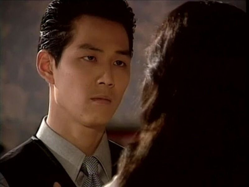 सैंडग्लास के एक दृश्य में ली जंग-जे (1995)